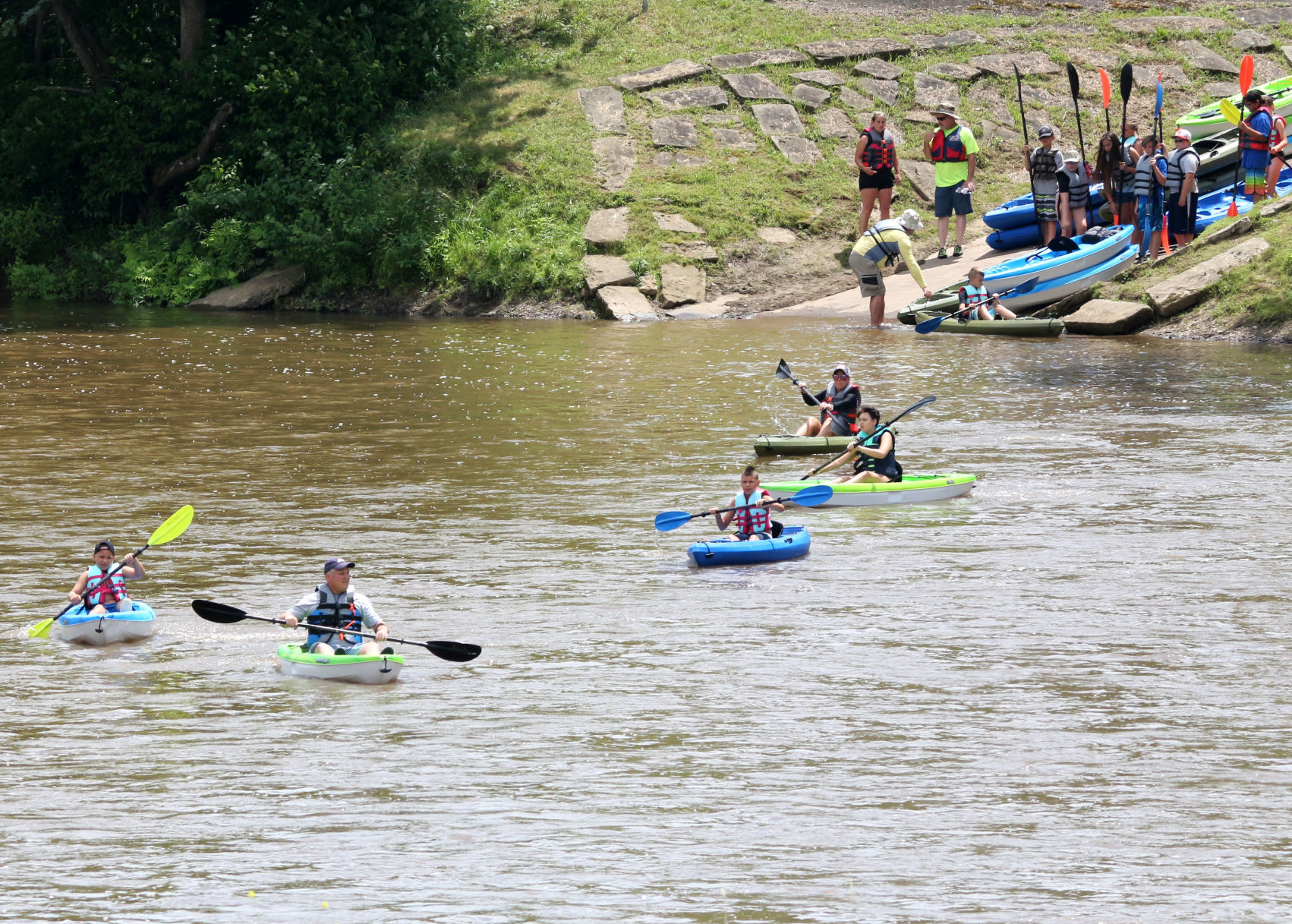 Salamanca Adventure Camp take kayaks down Allegany River in Olean